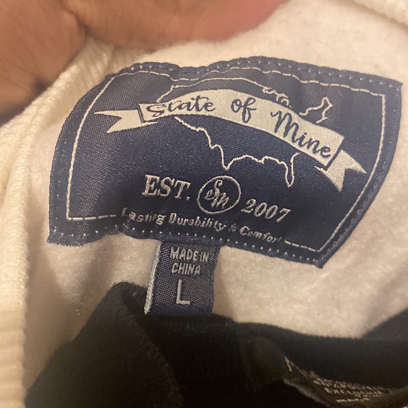 A white sweater with a leopard print sight saying ny - Picture 4 of 5